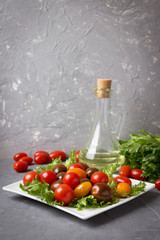 Fresh appetizer of lettuce and tomato.