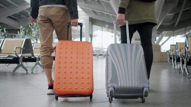 Couple come to aiport to travel.