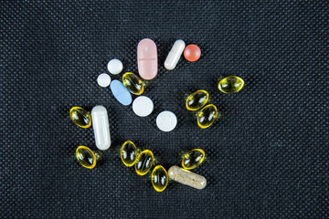 Fototapeta na wymiar Various pills, vitamin pills at the crowds, drugs enhancing supplements pharmacy, fish oil, vitamin complex