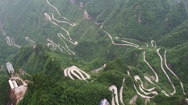A view of the dangerous  99 curves at the Tongtian Road to Tianmen Mountain, The Heaven's Gate at Zhangjiagie, Hunan Province, China, Asia
