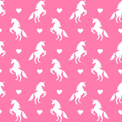 Fototapeta na wymiar Vector seamless pattern of white unicorn silhouette and heart isolated on pink background