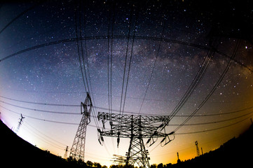 The outline of the power supply facilities and stars at night