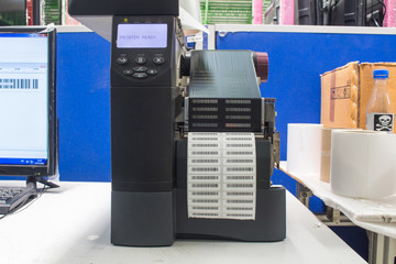 Barcode printer and barcode label with ribbon