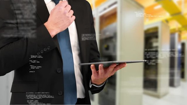 Business man using a digital tablet