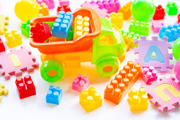 Colorful Kids toys on white.