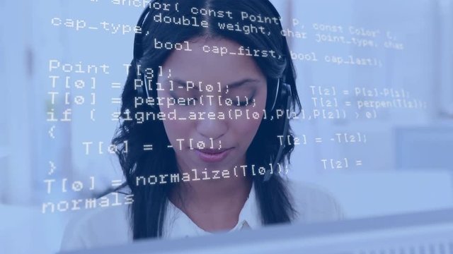 Woman wearing a headset while using a computer