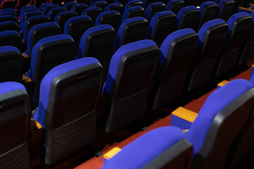 Naklejka premium Enter the blue color for watching the movie. Placed in multiple locations in the theater. Taken from the back