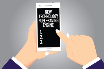 Handwriting text writing New Technology Fuel Saving Engine. Concept meaning Modern technologies for automobiles Hu analysis Hands Holding Pointing Touching Smartphone Blank Color Screen