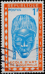 Beautiful wooden mask on postage stamp of Ivory Coast