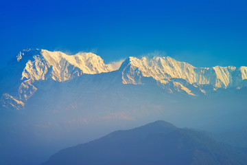The Annapurna massif in the morning time with sunrise, seen from Methlang Hill, Pokhara, Nepal.