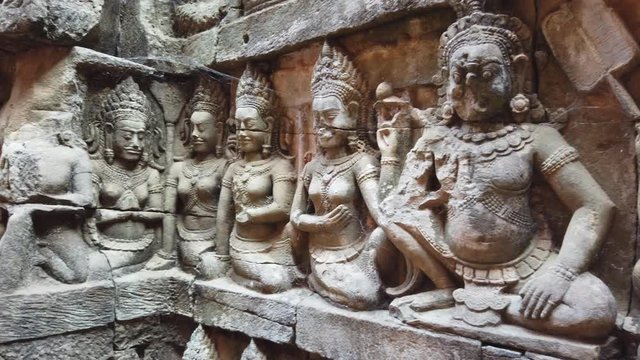 Ancient bas-relief on the walls of the Terrace of the Leper King, Angkor archaeological Park, Siem reap, Cambodia.