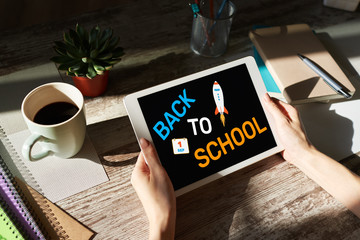 Back to school text on screen. Education and e-learning concept.