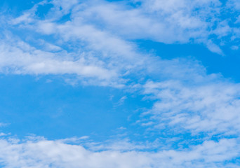 Naklejka na ściany i meble Clouds and blue sky background with copy space