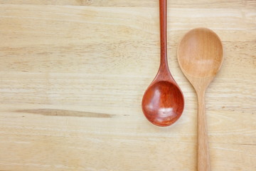 top view wooden spoon ,fork on wood floor with copy space