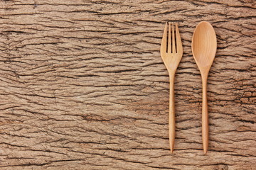 top view wooden spoon ,fork on wood floor with copy space