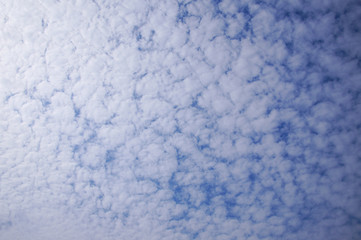 Fototapeta na wymiar Background with clouds on blue sky