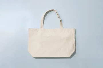 White Fabric Bag isolated on soft gray background for Mock up.High resolution photo.