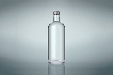 Clear wine or vodka bottle with silver cap. Isolated on gray background. Stock mock up. High resolution.