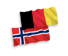 National vector fabric wave flags of Norway and Belgium isolated on white background. 1 to 2 proportion.