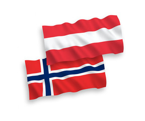 National vector fabric wave flags of Austria and Norway isolated on white background. 1 to 2 proportion.
