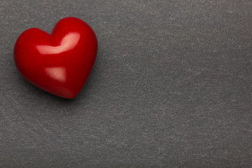 Obraz premium Heart on a stone background. Background to Valentine's Day.