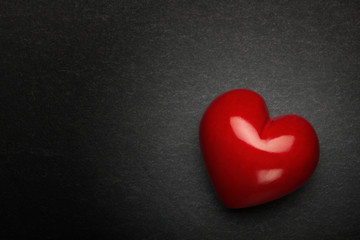 Heart on a stone background. Background to Valentine's Day.