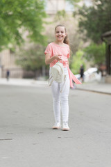 Fashion is her life. Fashionable little child in casual fashion on city street. Fashion look of small vogue model. Adorable girl of fashion on summer day