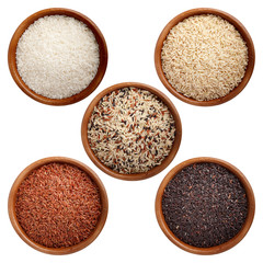 A set of wooden cups with rice: white rice, unpolished rice, red rice, black rice, mixed rice. Natural products, healthy food.