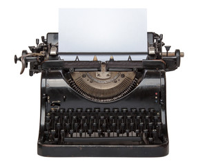 Old German typewriter with a sheet of white paper. Produced in 1946.