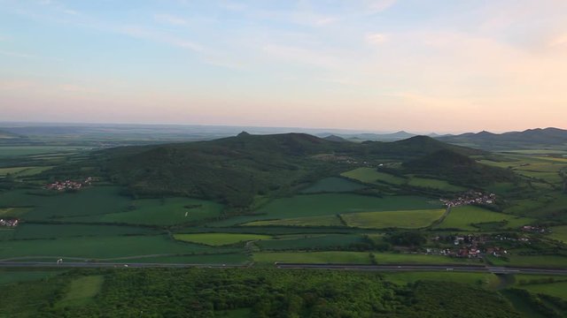 View from Lovos Hill. Sunset  in Central Bohemian Highlands, Czech Republic. Central Bohemian Uplands  is a mountain range located in northern Bohemia. The range is about 80 km long.