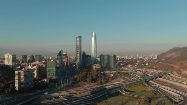 Aerial images at sunrise with drone of the titanium and costanera center buildings, located in Santiago, Chile