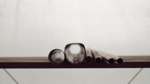 closeup shot of track bicycle tube set, hand takes one of tubes