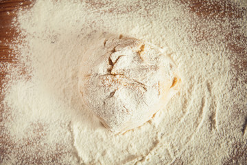 dough with farina on a cutting board