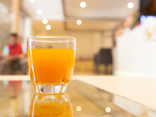 Orange juice in living room hotel.