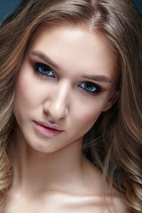 Closeup beauty portrait of young woman