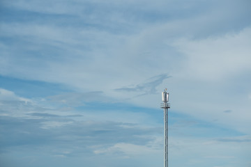 Signaling pole with blue sky background