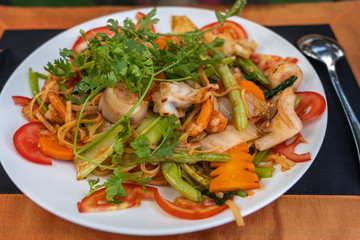Tasty Thailand dishes stir-fried seafood noodle and vegetable