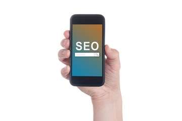 Hand holding black smartphone with text SEO (Search Engine Optimization) on smartphone screen. White backgroun. Seo concept