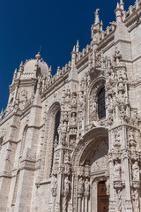 Fototapeta na wymiar bottom view of a fragment of the facade of the monastery of Jeronimos in the Portuguese capital Lisbon