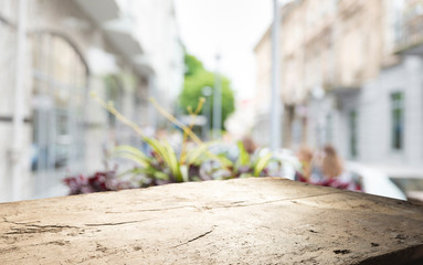 Empty of wood table top on blur of curtain with window view green from tree garden background.For montage product display or design key visual layout