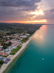 Aerial photo of Chaniotis village coastline during sunset, Kassandra peninsula of Chalkidiki