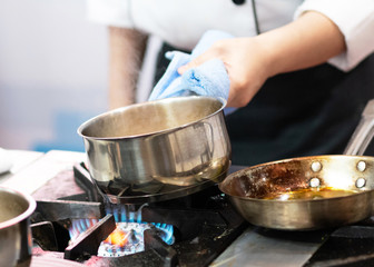 Chef preparing food, meal, in the kitchen, chef cooking