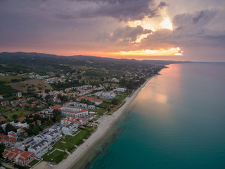 Aerial photo of Chaniotis village coastline during sunset, Kassandra peninsula of Chalkidiki