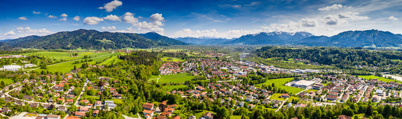 Aerial Bad Toelz Bavarian Alps in May. Old Town, Mountains, Isar River. Beautiful Travel destination