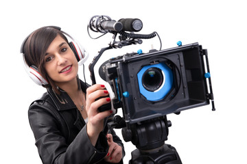 young woman with professional video camera, DSLR, on white
