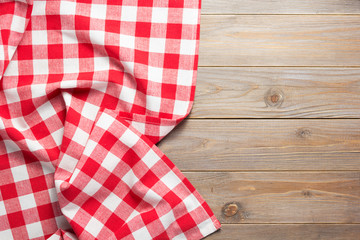 cloth napkin on at rustic wooden table background