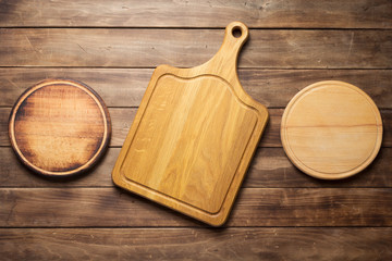 cutting board at wooden plank table