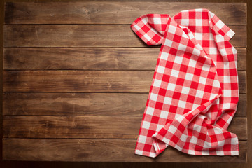 cloth napkin on at rustic wooden plank