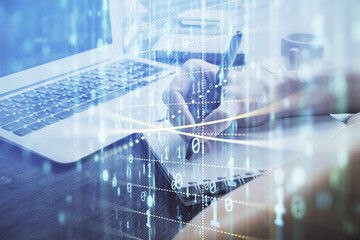 Multi exposure of writing hands on background with data solution hologram. Technology concept.