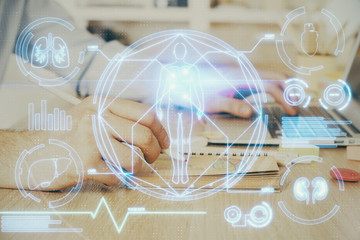 Science hologram with man working on computer on background. Concept of study. Double exposure.